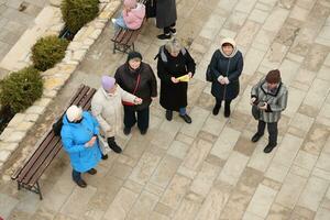 TERNOPIL, UKRAINE - APRIL 2, 2023 Many people during mission in complex of Ukrainian Jerusalem in the Mari spiritual center of Zarvanytsia In the Terebovlya district of the Ternopil photo