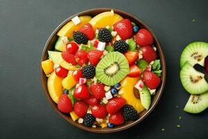 Bowl of healthy fresh fruit salad. background. AI Generative Pro Photo