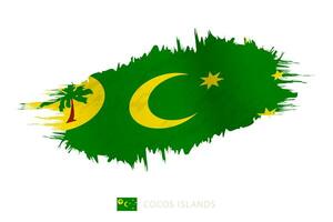 pintado pincelada bandera de cocos islas con ondulación efecto. vector