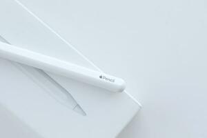 KYIV, UKRAINE - 4 MAY, 2023 New Apple pencil generation 2. Features a flat edge that attaches magnetically for automatic charging and pairing photo