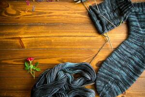 Set for hand knitting warm winter socks made of natural woolen yarn. photo