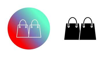 icono de vector de bolsas de compras únicas