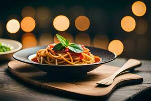 spaghetti with tomato sauce and basil leaves in a black bowl on a wooden table. AI-Generated photo