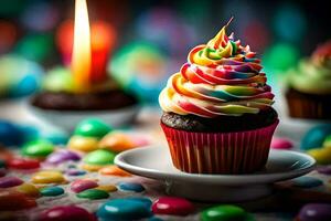 a cupcake with rainbow icing and candles on a table. AI-Generated photo