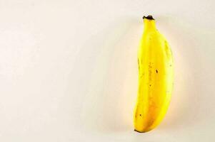 a banana on a white background photo