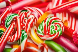 many different colored candy canes are arranged in a pile. AI-Generated photo