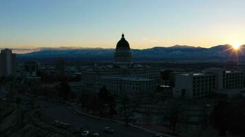 SALT LAKE CITY, USA - JANUARY 30, 2021 Salt Lake City Capitol Building at Sunset in Winter. Utah, USA. Aerial View. Golden Hour. Drone is Orbiting Clockwise video