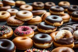 a bunch of donuts are sitting on a table. AI-Generated photo