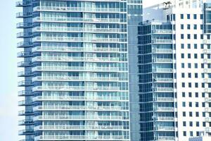 a tall building with many windows and balconies photo