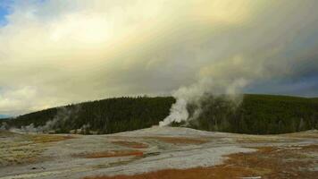 Old Faithful Geyser Eruption in Yellowstone National Park, Wyoming, USA, Wide Shot. Time Lapse video