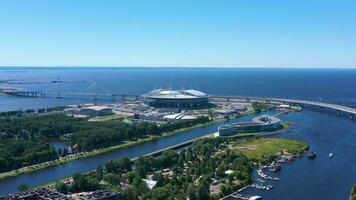 SAINT-PETERSBURG, RUSSIA - JUNE 22, 2019 Gazprom Arena Stadium on Sunny Summer Day. Aerial View. Russia. Drone is Orbiting. View from Central Park video