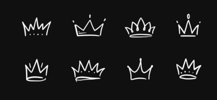 Doodle crown hand drawn set. Doodle princess crown, queen tiara. Line sketch royal element. Queen, king hand drawn simple design element. Isolated vector