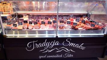 Warsaw, Poland. 28 October 2023. Tradycja Smaku cold cuts and meat stand at the Norblin Factory. photo