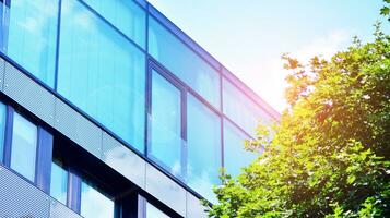 Modern building.Modern office building with facade of glass photo