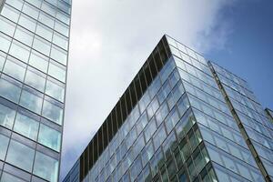 Modern building.Modern office building with facade of glass photo