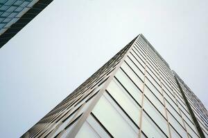Modern building.Modern office building with facade of glass photo