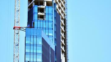 Modern building.Modern office building with facade of glass photo