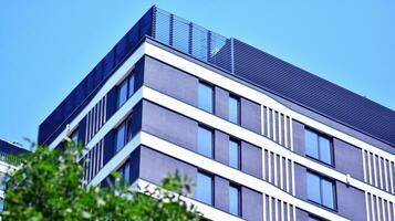 Modern building.Modern office building with facade of glass photo