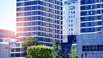 Modern building.Modern office building with facade of glass photo