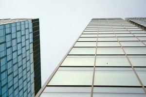 Modern building.Modern office building with facade of glass photo