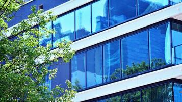 Modern building.Modern office building with facade of glass photo