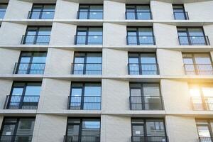 Modern European residential apartment buildings quarter. Abstract architecture, fragment of modern urban geometry. photo