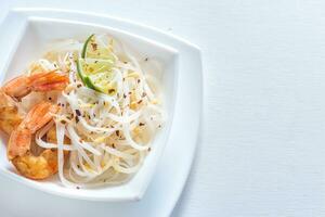 Rice noodles with shrimps and bean sprouts photo