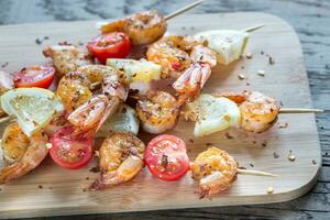 Skewers with shrimps photo