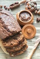 Loaf of banana-chocolate bread with chocolate cream photo