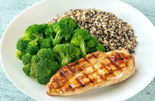 Grilled chicken with broccoli and quinoa photo