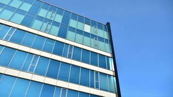 Modern building.Modern office building with facade of glass photo