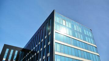 Modern building.Modern office building with facade of glass photo