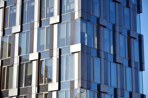 Modern building.Modern office building with facade of glass photo