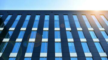 Modern building.Modern office building with facade of glass photo