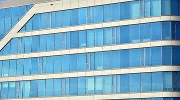 Modern building.Modern office building with facade of glass photo