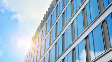 Modern building.Modern office building with facade of glass photo