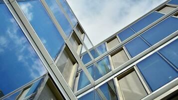 Modern building.Modern office building with facade of glass photo