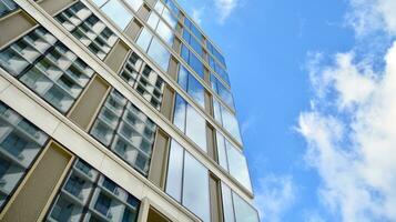 Modern building.Modern office building with facade of glass photo