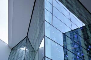Modern building.Modern office building with facade of glass photo