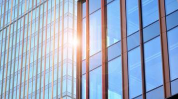 Modern building.Modern office building with facade of glass photo