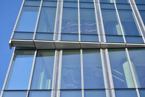 Modern building.Modern office building with facade of glass photo
