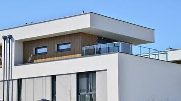 New build single family house. Suburban area with modern geometric family house. photo