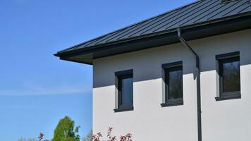 New build single family house. Suburban area with modern geometric family house. photo