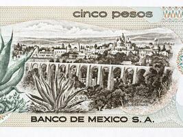 Aqueduct and buildings in the state of Queretaro from old Mexican money photo