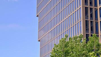 Modern building.Modern office building with facade of glass photo