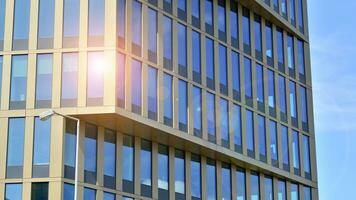 Modern building.Modern office building with facade of glass photo