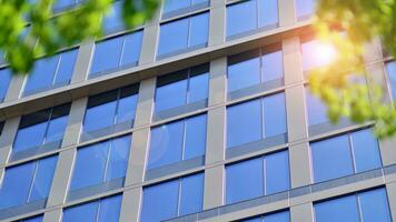 Modern building.Modern office building with facade of glass photo