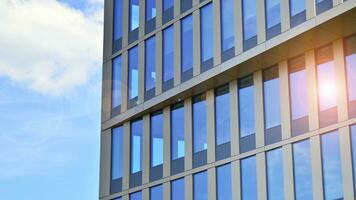 Modern building.Modern office building with facade of glass photo