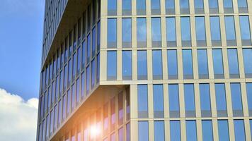 Modern building.Modern office building with facade of glass photo