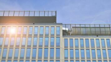 Modern building.Modern office building with facade of glass photo